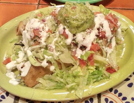 There are rolled tacos under here, I just know it.